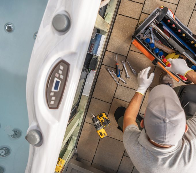 Hot Tub Technician Repairing Jets